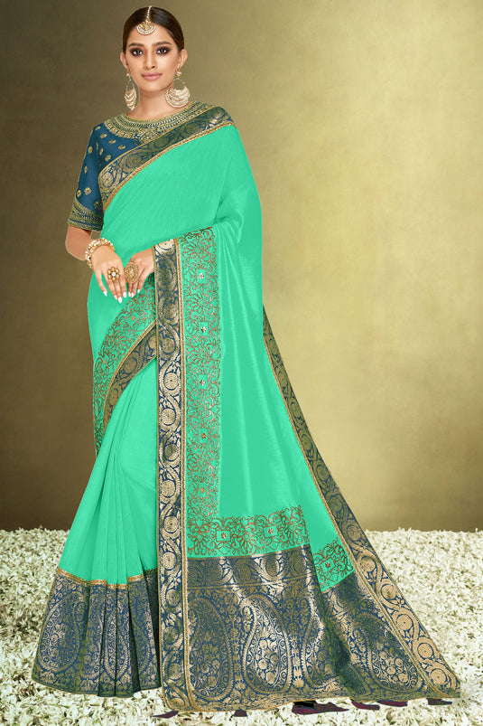 Radiant Function Wear Sea Green Color Satin Silk Fabric Saree