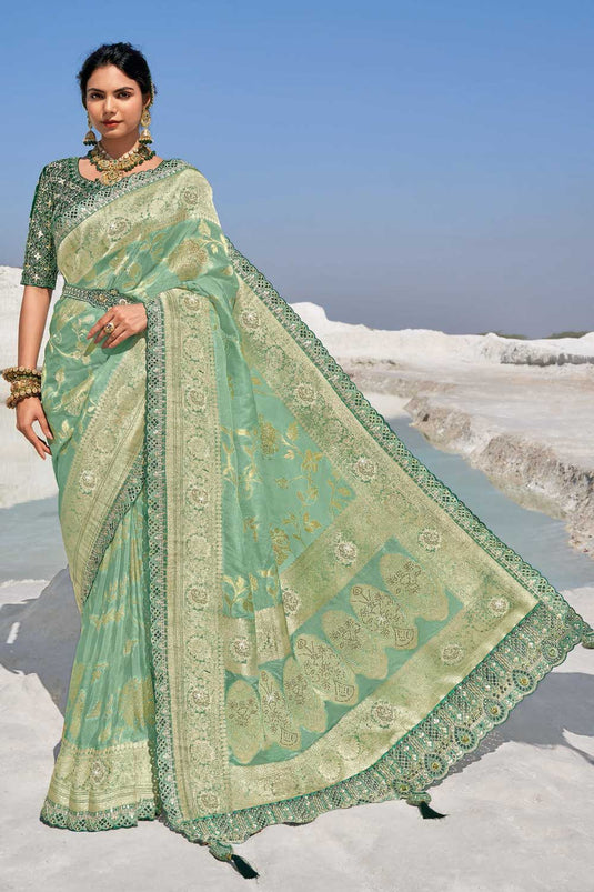 Soothing Sea Green Color Silk Fabric Wedding Wear Saree