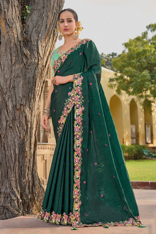 Radiant Border Work On Dark Green Color Organza Silk Fabric Saree