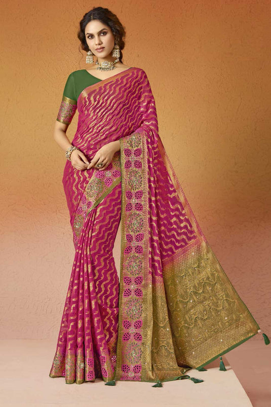 Alluring Rani Color Embroidered Georgette Saree