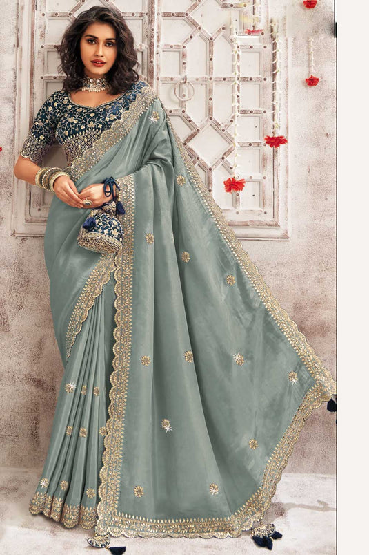 Graceful Organza Grey Color Saree With Border Work