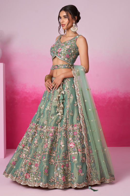 Sea Green Sequins Work Net Fabric Reception Wear Lehenga With Enchanting Blouse