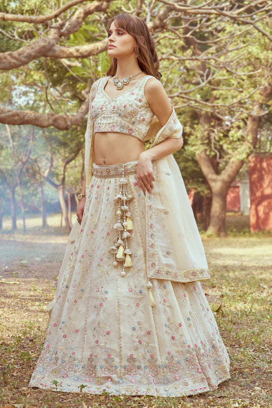 Ornate Heavy Embroidered Bridal Lehenga Choli In Cream Color