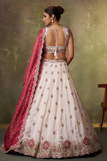 Off White Wedding Wear Tissue Embroidered Lehenga Choli With Dupatta