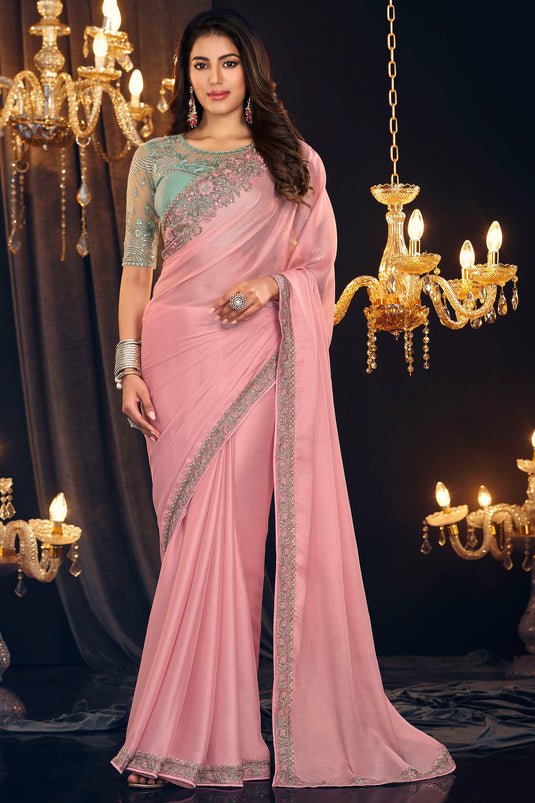 Border Work On Peach Color Sober Saree In Georgette Fabric