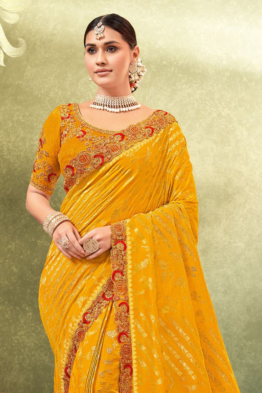 Weaving Work On Yellow Color Aristocratic Dola Silk Fabric Saree