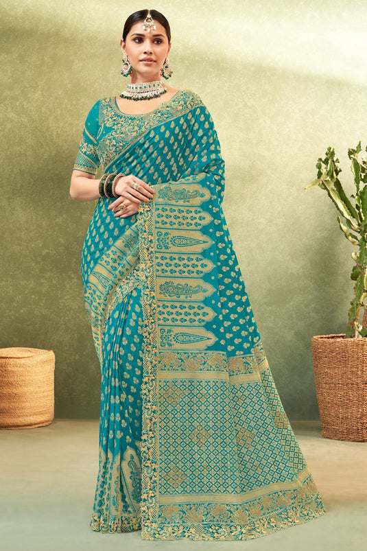 Weaving Work On Flamboyant Dola Silk Fabric  Saree In Cyan Color