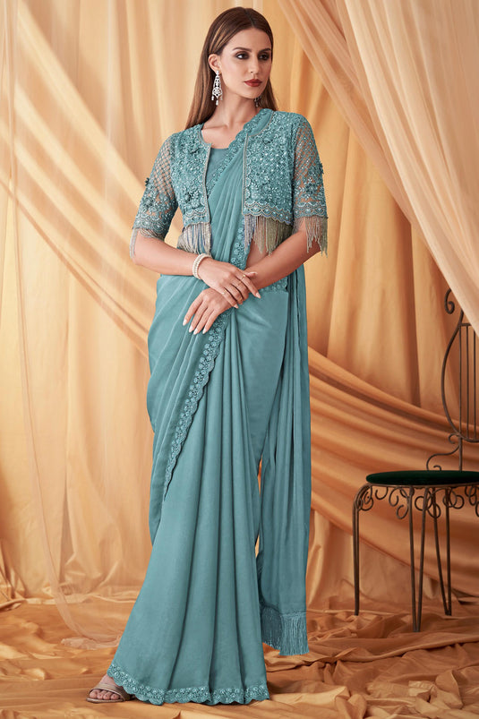 Larissa Bonesi Fashionable Cyan Color Satin Georgette Saree With Jacket