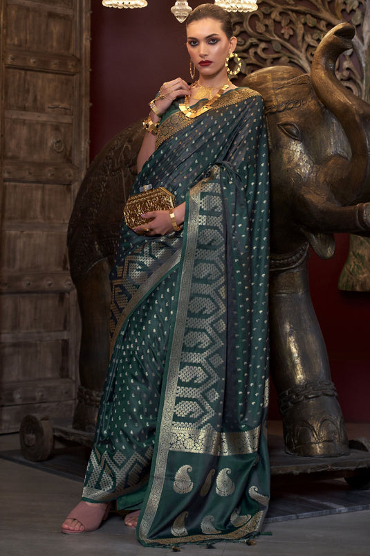 Beguiling Weaving Work On Dark Green Color Satin Silk Fabric Saree