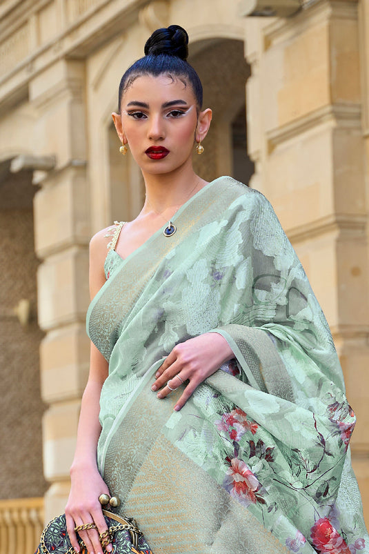 Trendy Brasso Fabric Sea Green Color Saree With Printed Work