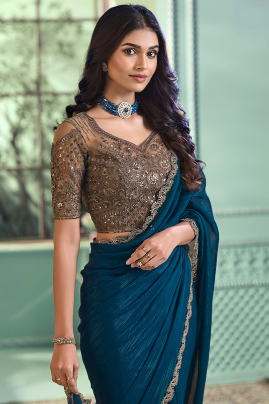 Entrancing Georgette Fabric Saree In Teal Color With Border Work