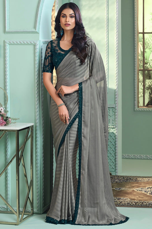 Amazing Grey Color Georgette Fabric Saree With Border Work