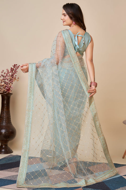 Sequins Work On Net Fabric Bewitching Saree In Light Cyan Color