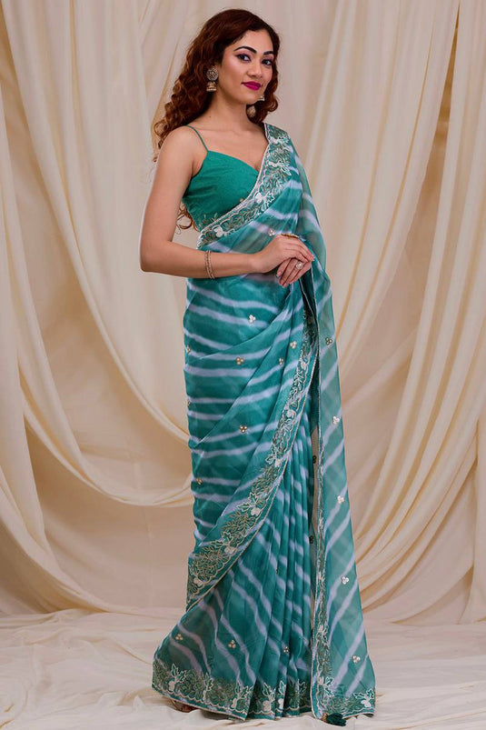 Creative Border Work On Green Color Georgette Fabric Saree