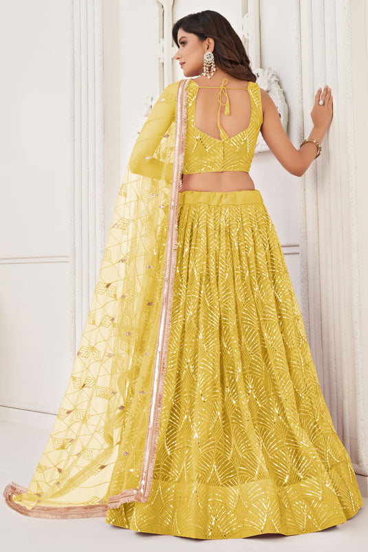 Function Wear Sequins Work Yellow Color Fashionable Lehenga In Net Fabric