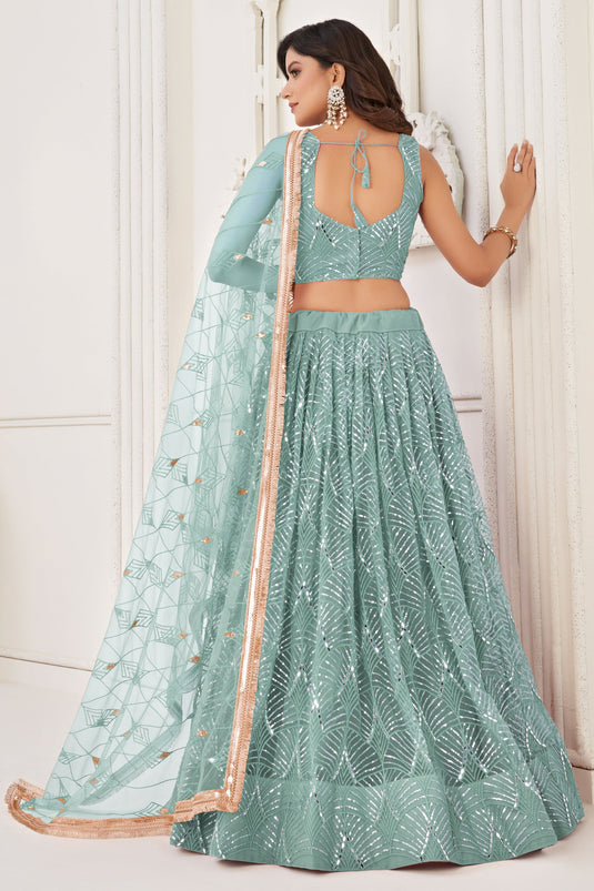 Net Fabric Sequins Work Light Cyan Color Glorious Lehenga In Function Wear