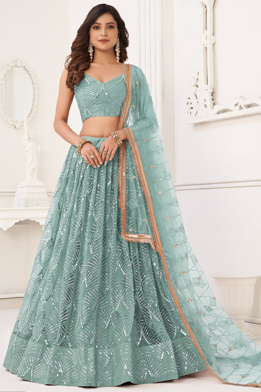 Net Fabric Sequins Work Light Cyan Color Glorious Lehenga In Function Wear