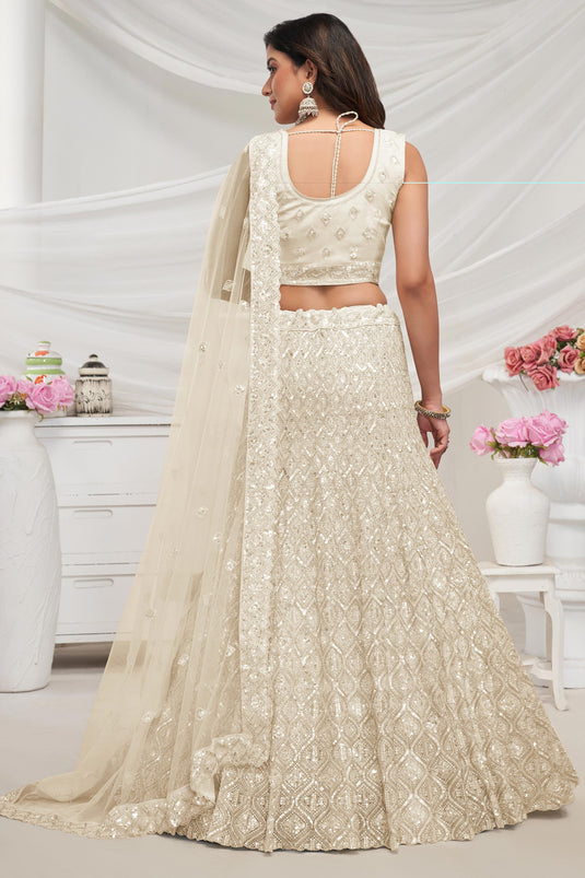 Ingenious Embroidered Cream Color Net Fabric Lehenga