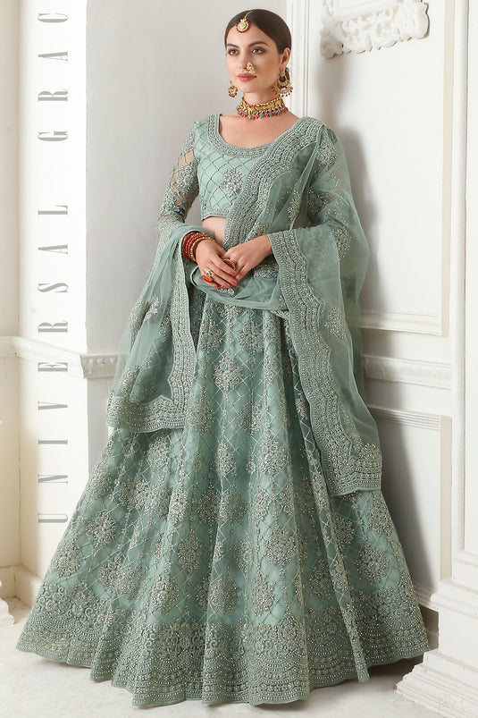 Excellent Sea Green Color Net Fabric Lehenga With Embroidery Work