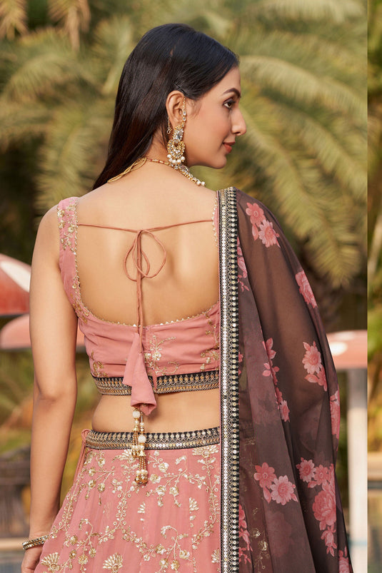 Radiant Sequins Embroidered Peach Color Georgette Fabric Lehenga