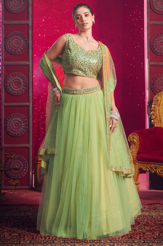 Sangeet Function Net Fabric Ravishing Lehenga In Green Color