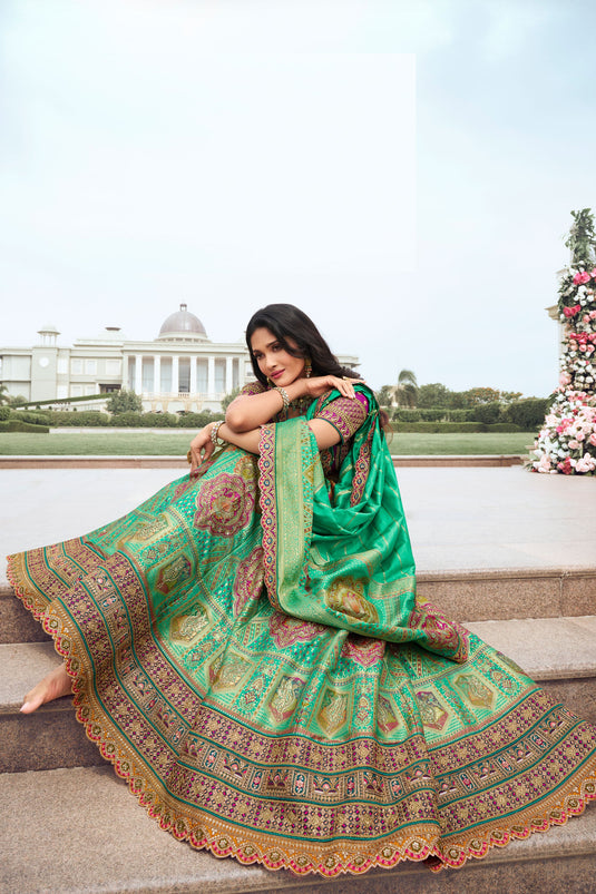 Engaging Sea Green Color Silk Fabric Wedding Wear Bridal Lehenga