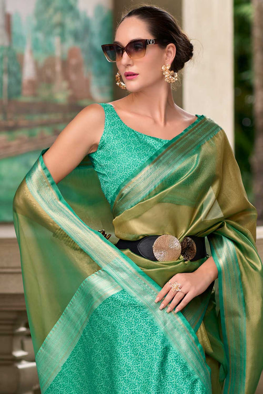 Weaving Work On Cyan Color Aristocratic Tissue Silk Fabric Saree