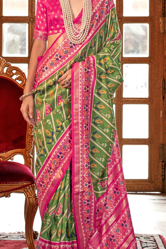 Tempting Art Silk Sea Green Color Patola Printed Saree