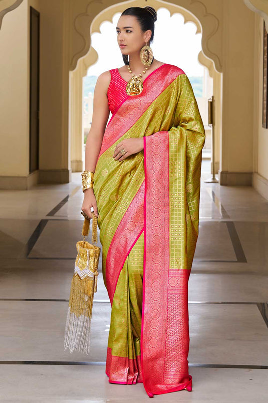 Creative Weaving Work On Banarasi Silk Saree In Olive Color