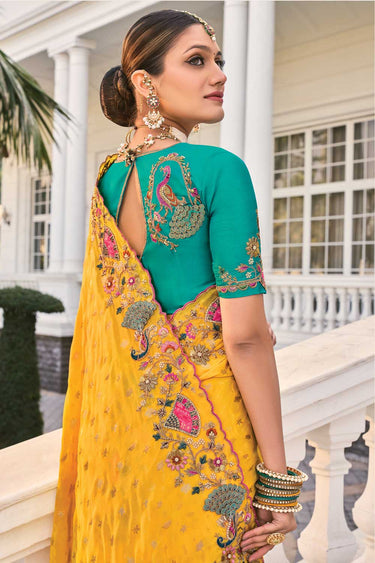 Alluring Yellow Color Stone and Thread Work Crepe Saree