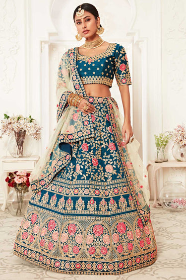 Silk Fabric Teal Color Riveting Lehenga With Sequins Work