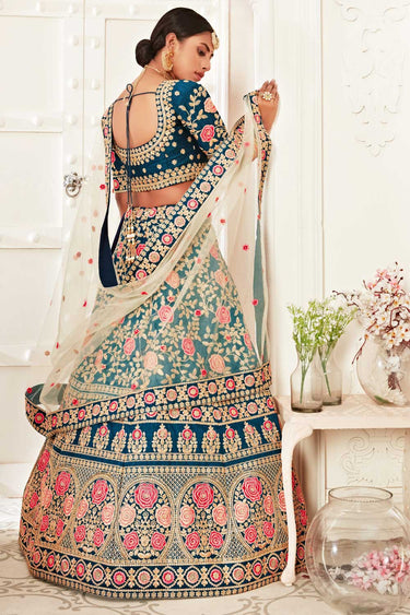 Silk Fabric Teal Color Riveting Lehenga With Sequins Work