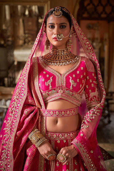 Rani Heavy Embroidered Silk Beatific Bridal Lehenga Choli