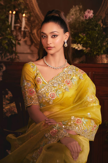 Excellent Organza Fabric Yellow Color Saree With Border Work