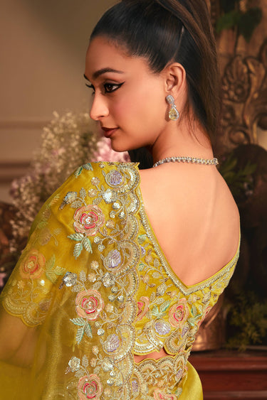 Excellent Organza Fabric Yellow Color Saree With Border Work
