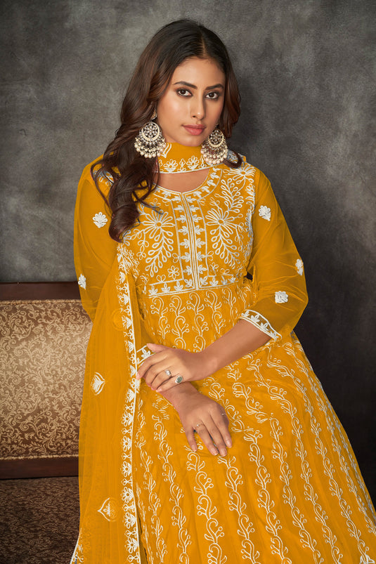 Creative Embroidered Net Fabric Anarkali Suit In Yellow Color