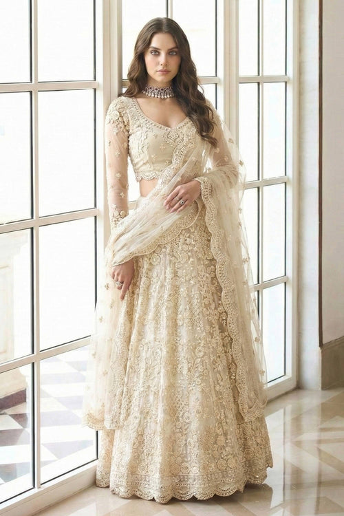 White Wedding Wear Net Embroidered Lehenga Choli With Dupatta