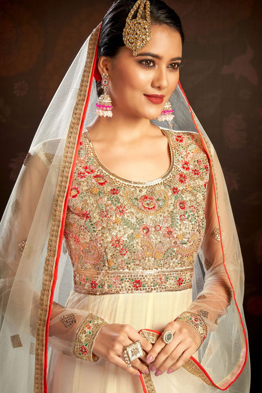 Radiant Off White Color Net Fabric Embroidered Anarkali Suit