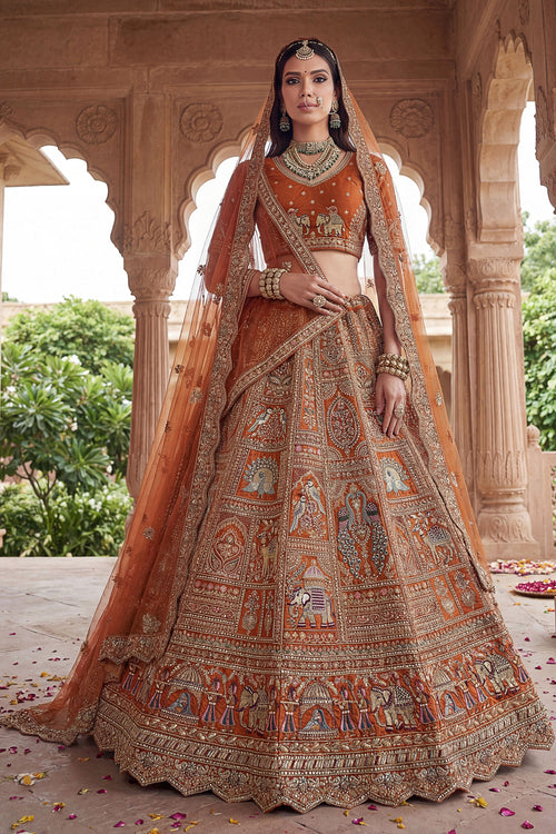 Orange Heavy Embroidered Designs Bridal Lehenga Choli