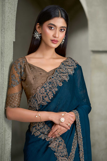 Traditional Georgette Teal Embroidered Lace Border Saree With Unstitched Blouse