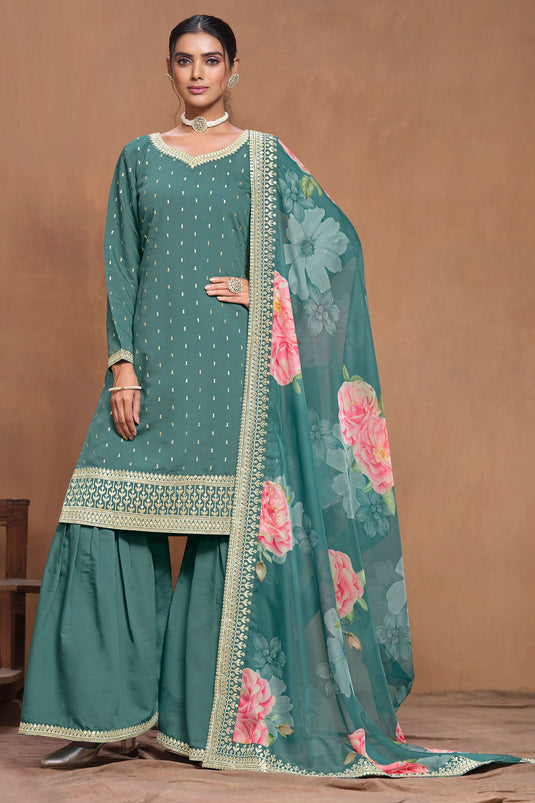 Engaging Teal Color Art Silk Fabric Palazzo Suit With Floral Design Dupatta