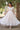 Fancy Fabric Luminous Readymade Long Gown In White Color