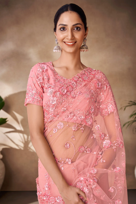 Tempting Net Fabric Peach Color Saree With Sequins Work