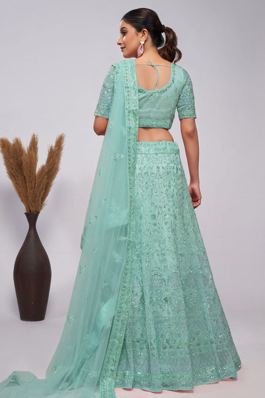 Net Fabric Sea Green Color Excellent Lehenga With Sequins Work