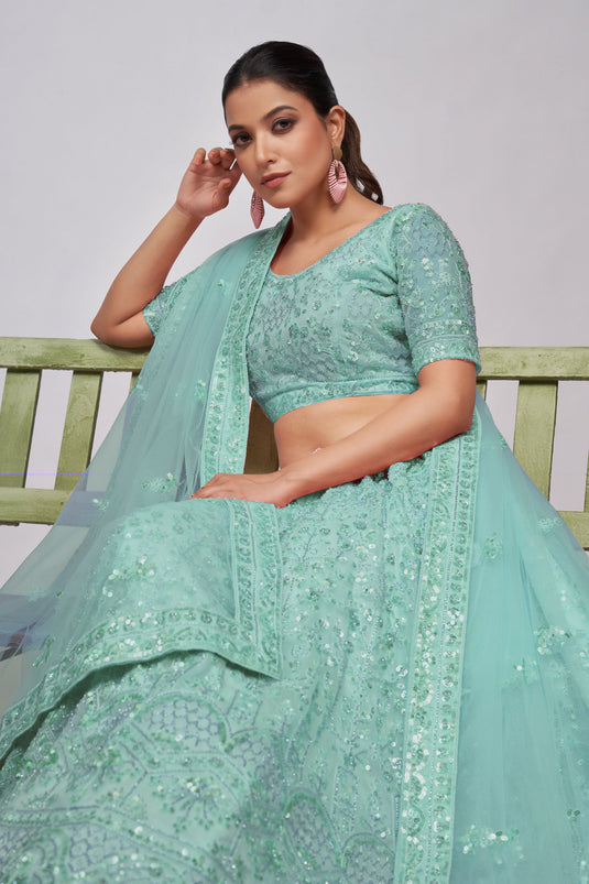 Net Fabric Sea Green Color Excellent Lehenga With Sequins Work