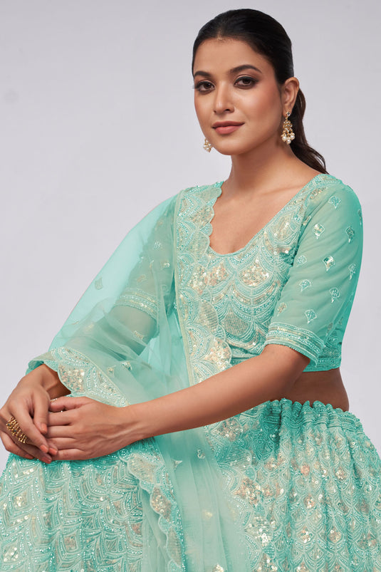 Graceful Net Fabric Sea Green Color Lehenga With Sequins Work