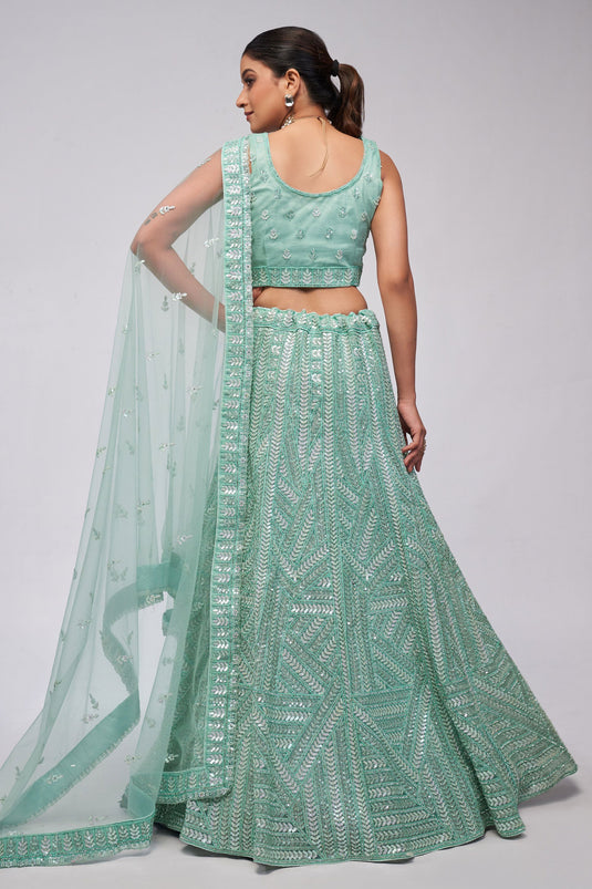 Amazing Sea Green Color Net Fabric Lehenga With Sequins Work