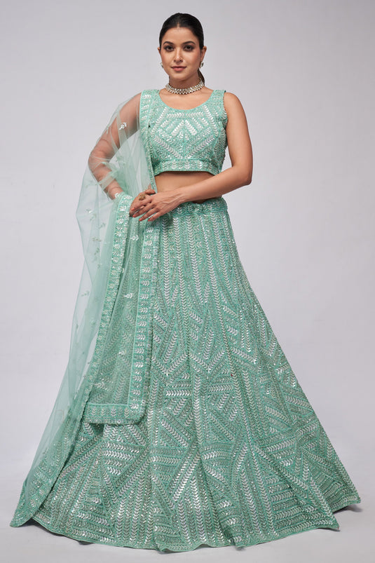 Amazing Sea Green Color Net Fabric Lehenga With Sequins Work