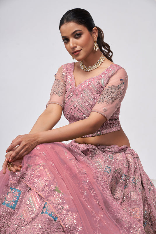 Sober Pink Color Net Fabric Lehenga With Sequins Work