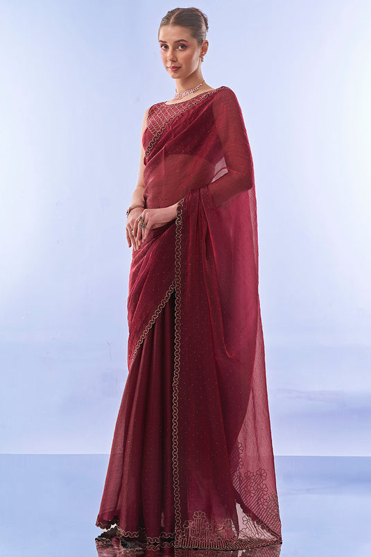 Phenomenal Swarovski work Maroon Color Fancy Fabric Saree